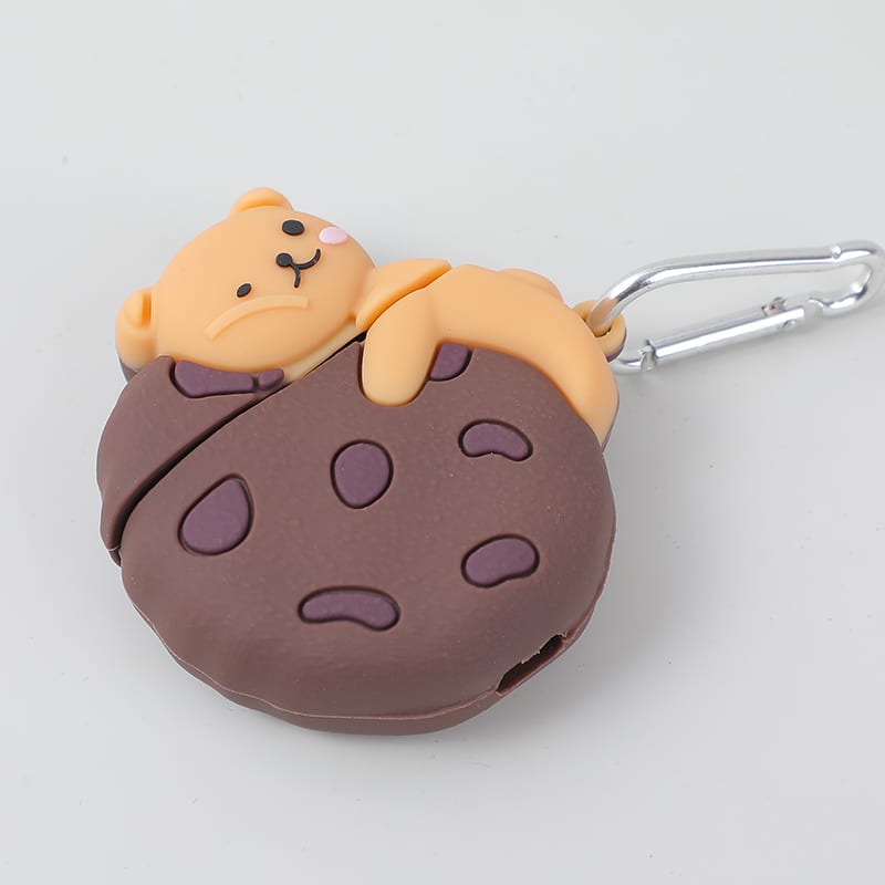 Vista frontal completa de la funda para audífonos con forma de galleta