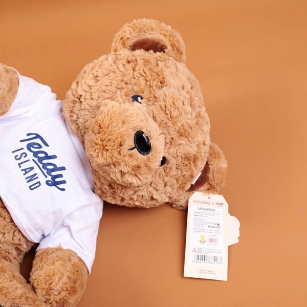 Muñeco de Peluche Oso Sentado con Camiseta Azul TEDDY ISLAND - 35 cm (Color Oscuro) - Imagen 3