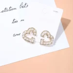 Aretes Dorados en Forma de Corazón para Mujer